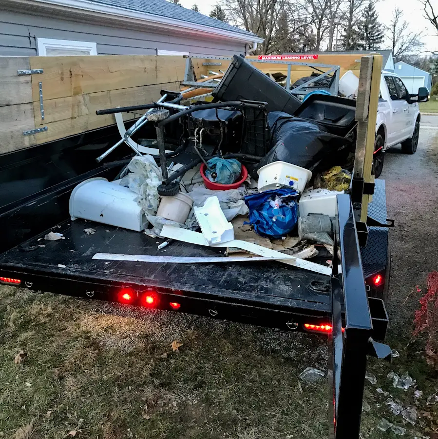 Roll-off dumpster delivered to a residential driveway in Clayton
