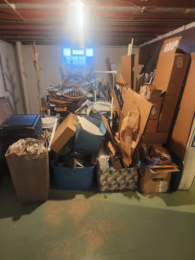 Roll-off dumpster container at job site for 20 Yard Dumpster Rental in Clayton